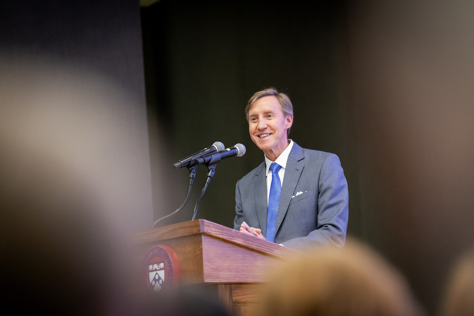 Penn President J. Larry Jameson behind a podium.