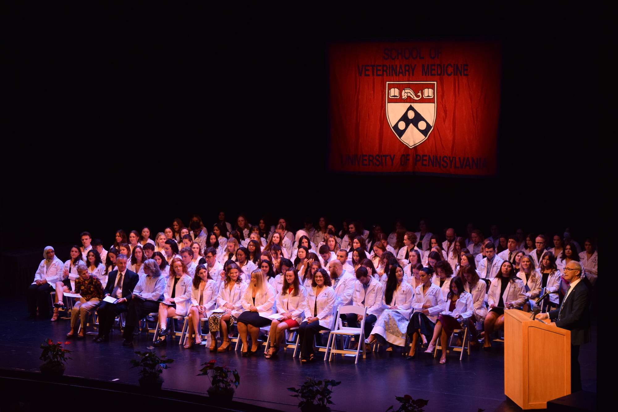 Penn Vet students on stage at the White Coat Ceremony.