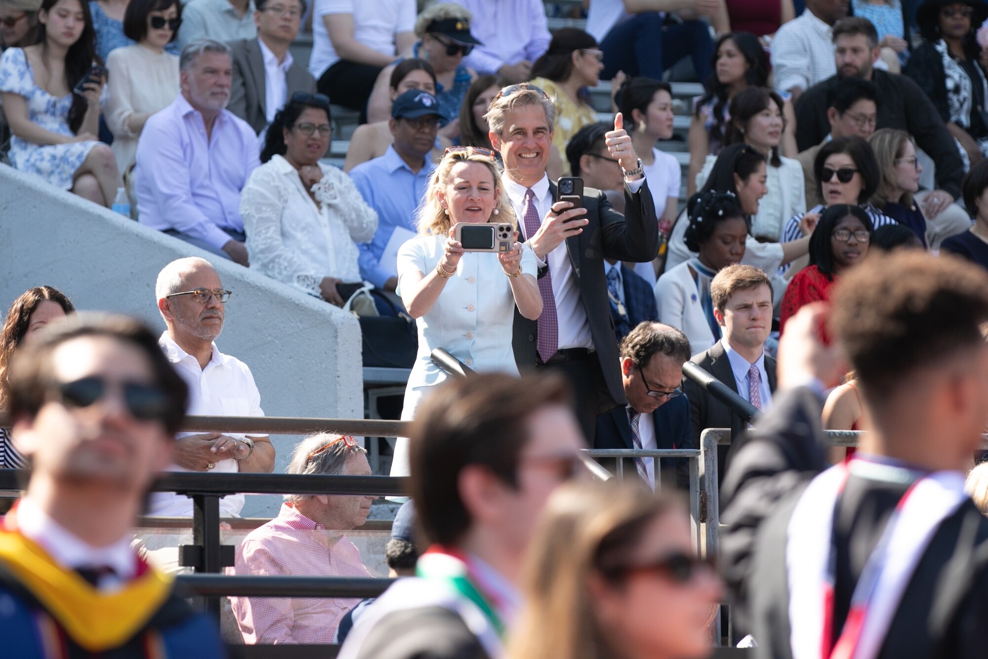Spectators in the bleachers at Penn’s commencement