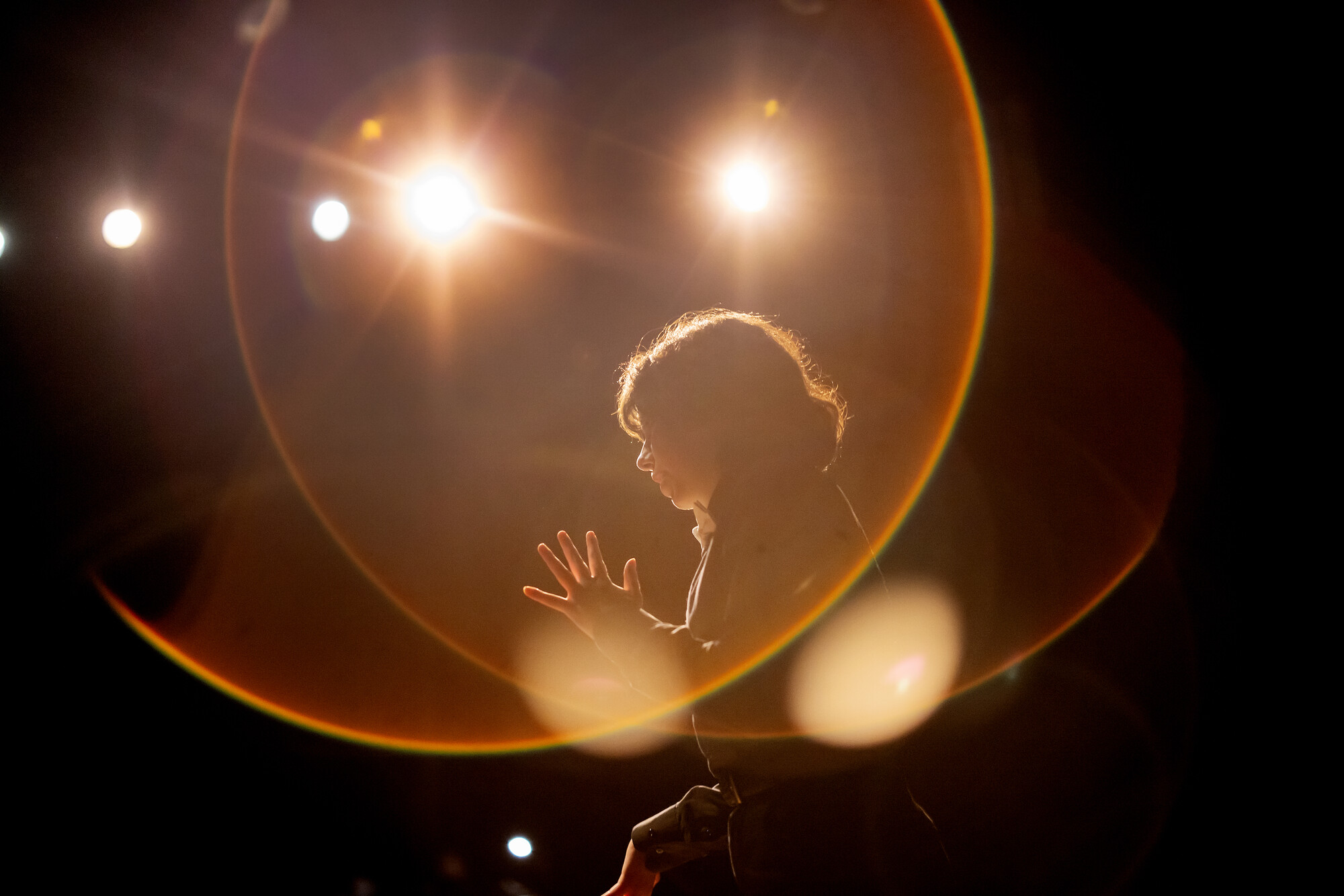 One Acts performer rehearsing on stage.