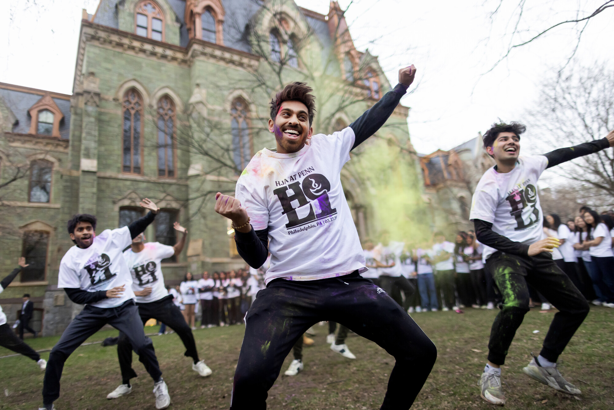 Penn students performing a dance during Holi on College Green