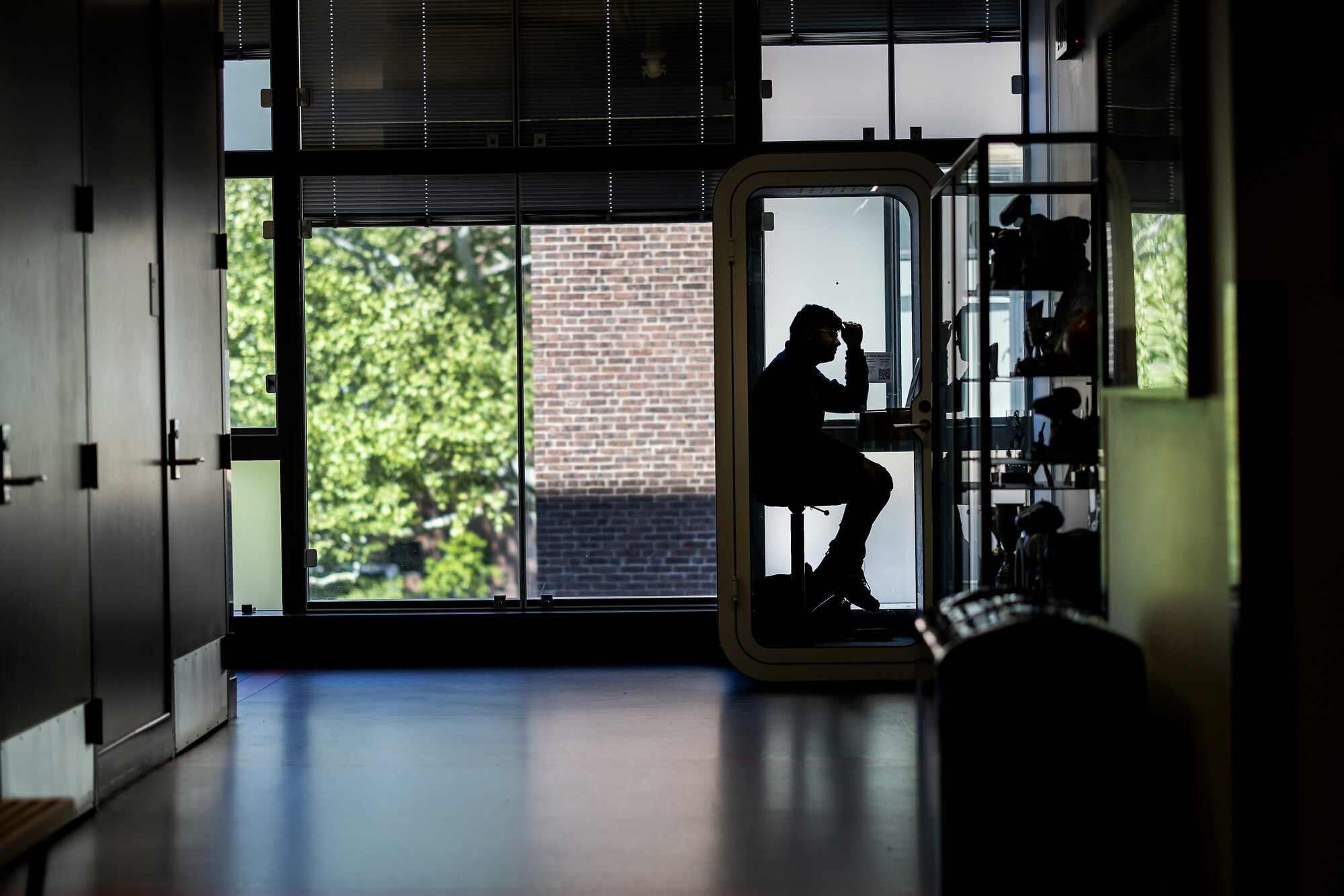 A student in a study pod.