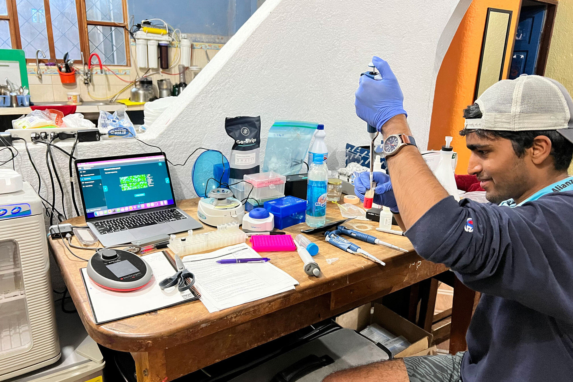 Arnav Lal prepares samples for sequencing.