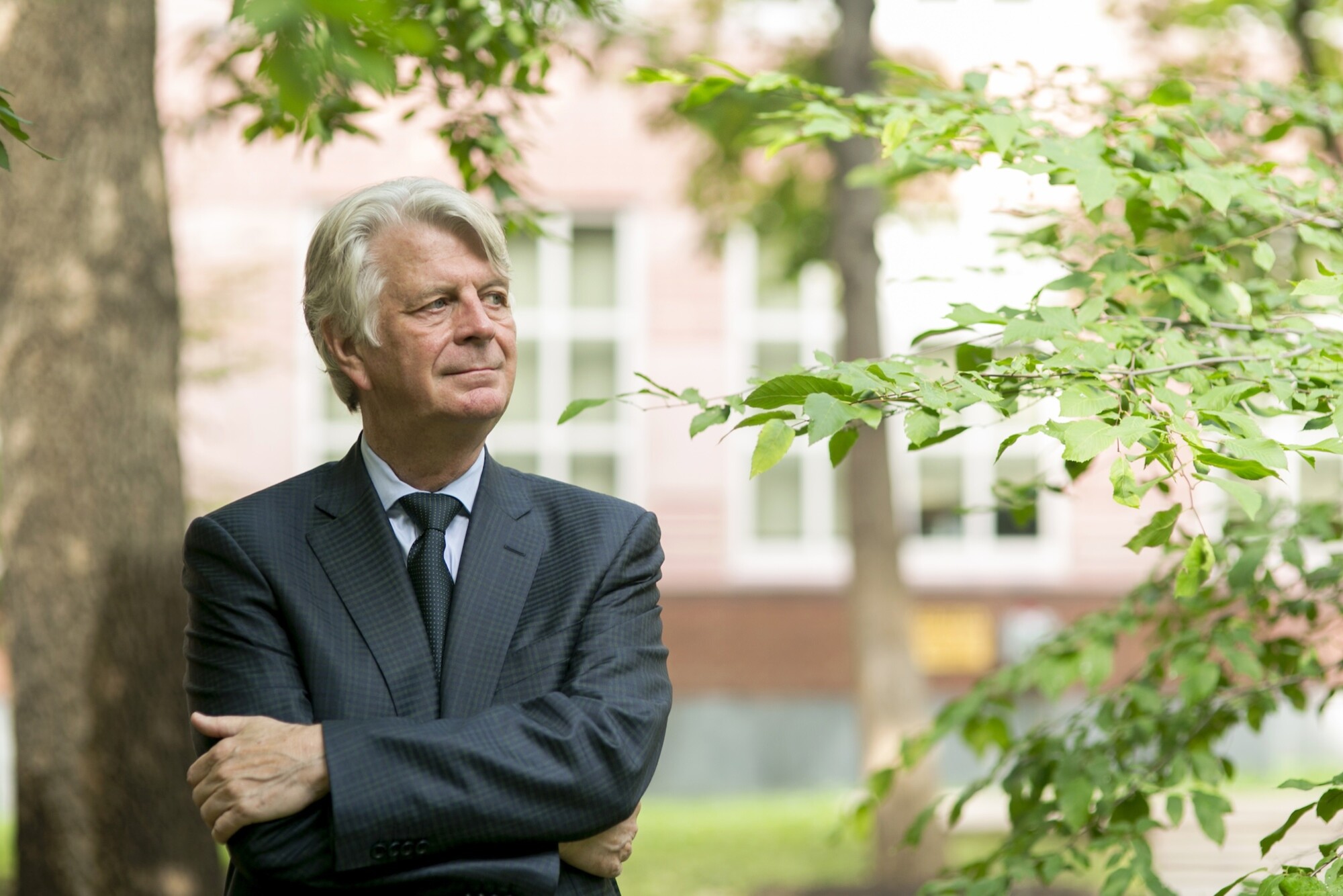 Fritz Steiner standing next to a tree.