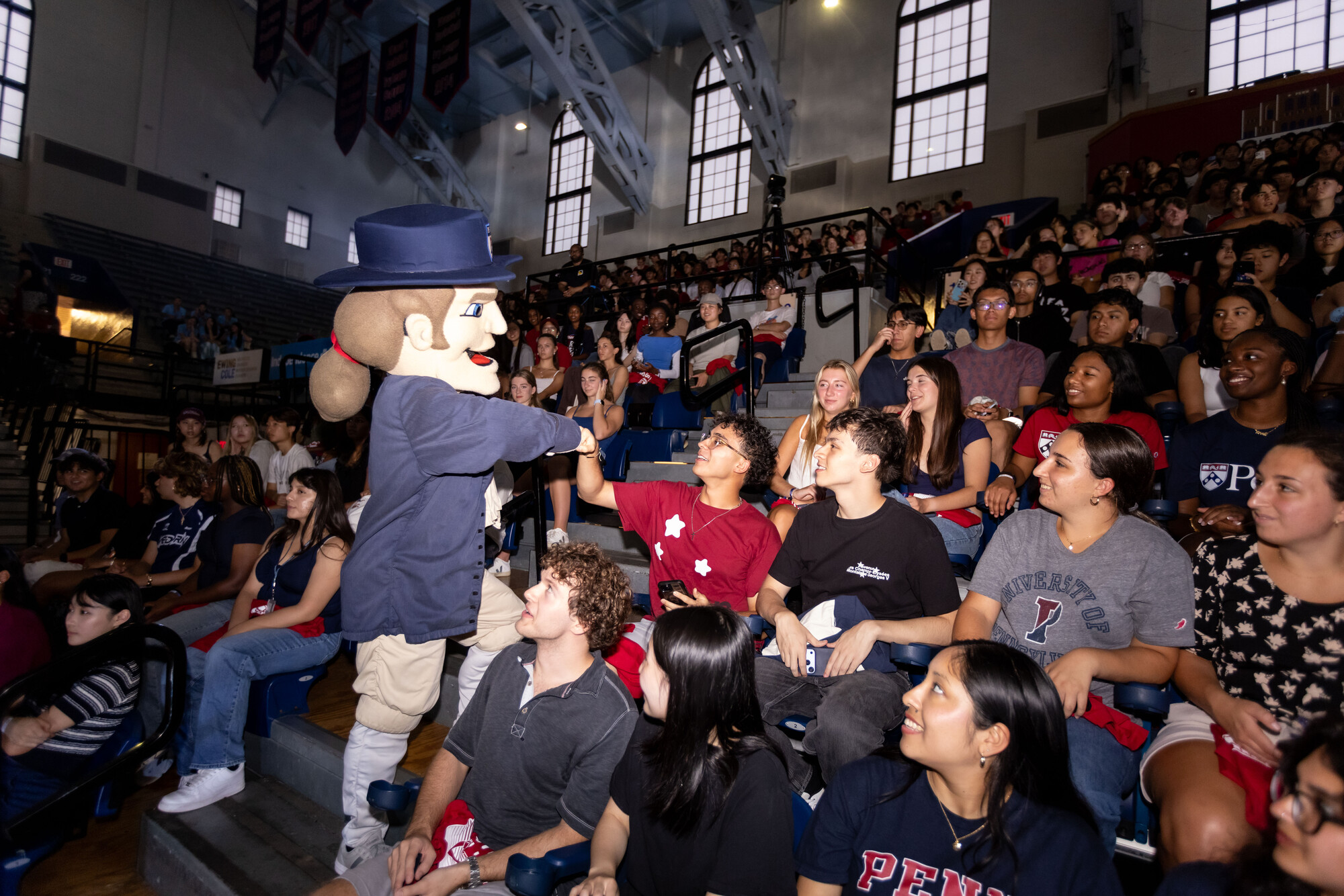 The Penn Quaker in the stands at the Palestra with the Class of 2030.