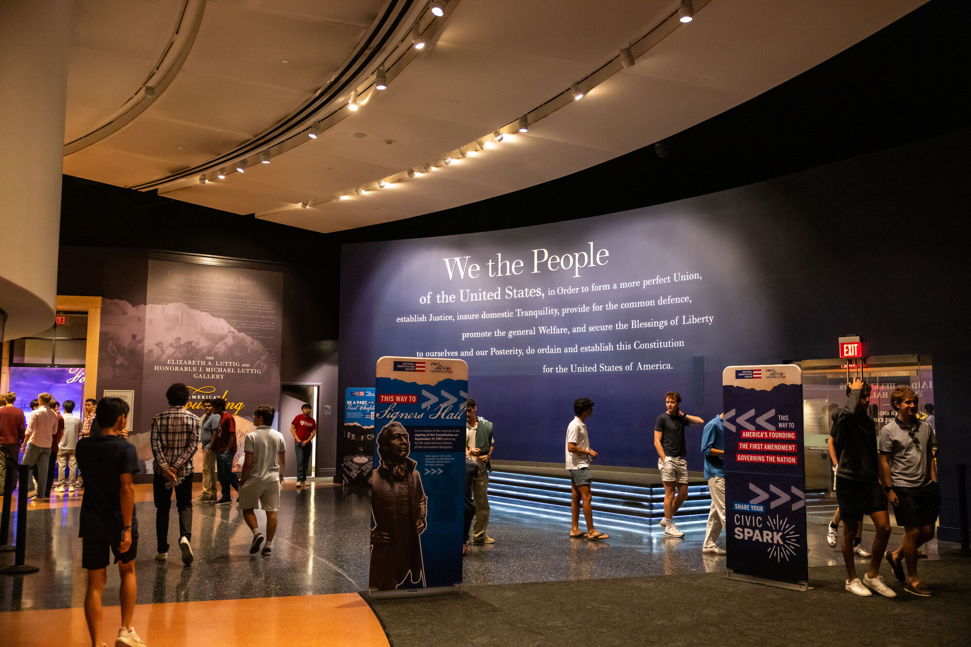 Students looking at the We the People exhibit at the Constitution Center.
