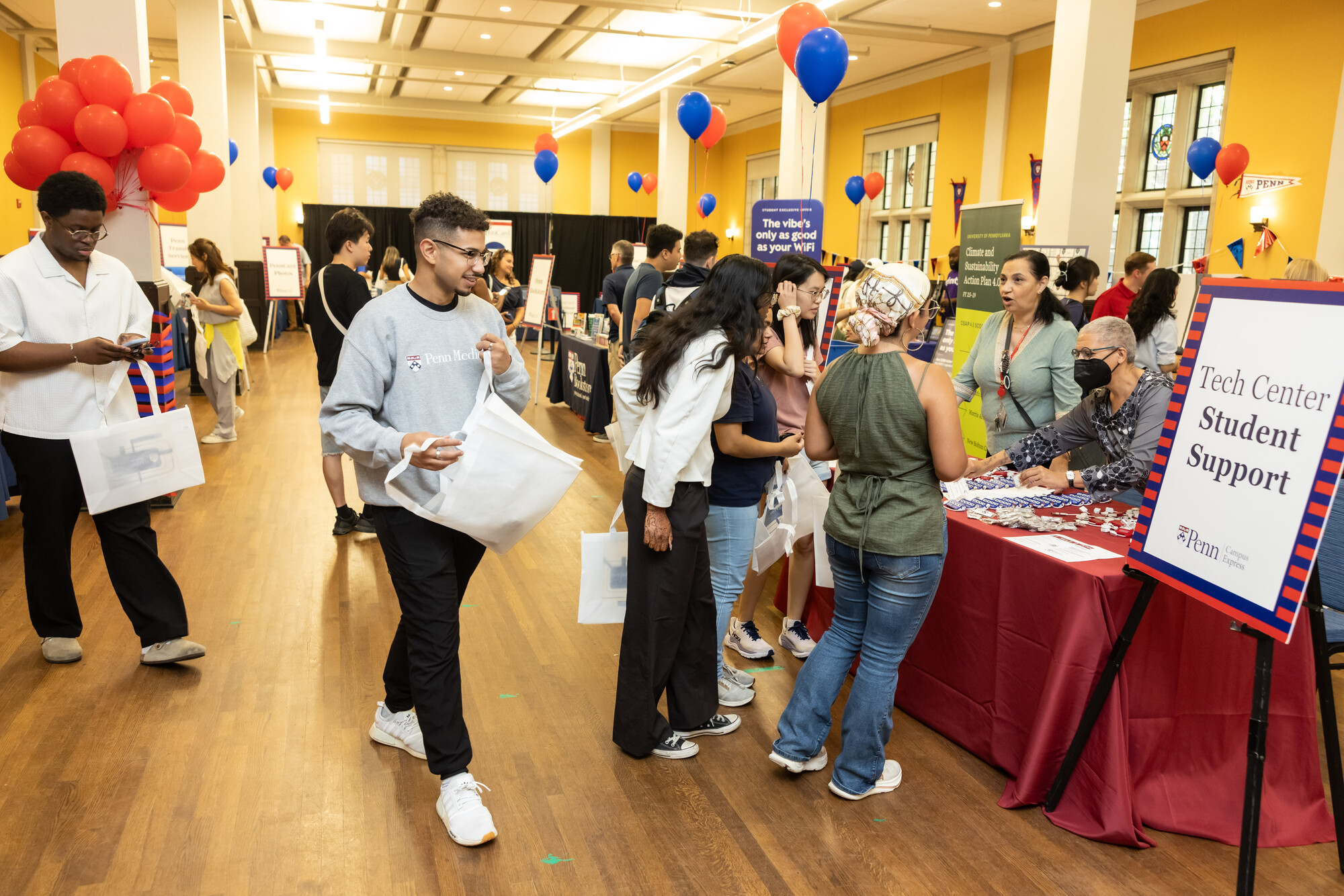 Penn students at a resource fair in Houston Hall.