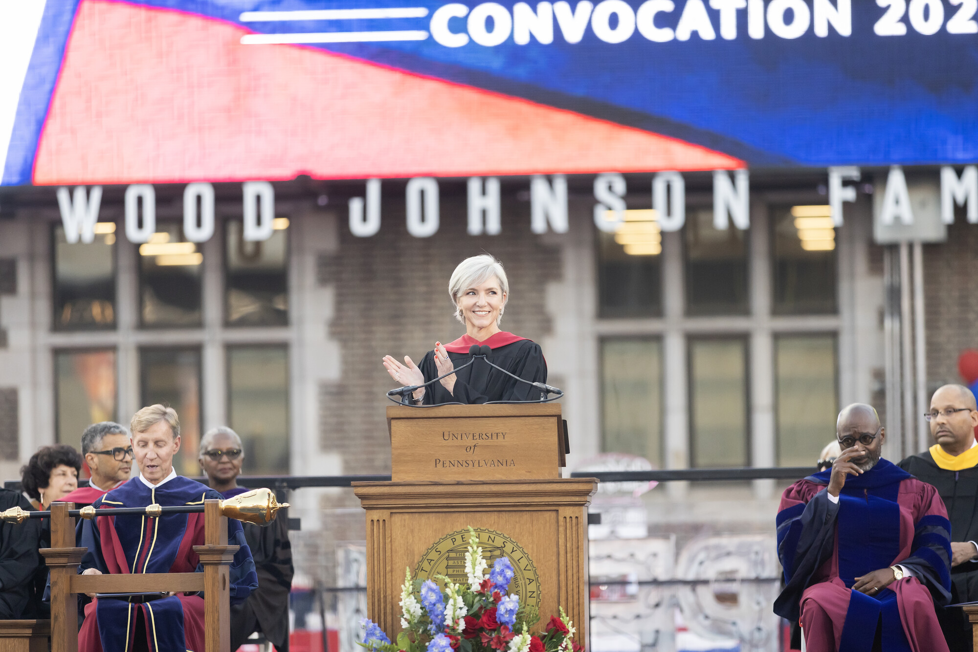 Whitney Soule speaking at the podium at Convocation.