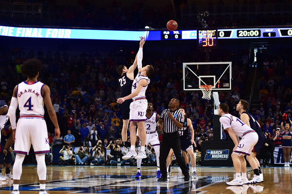 Starting game on court with jump ball