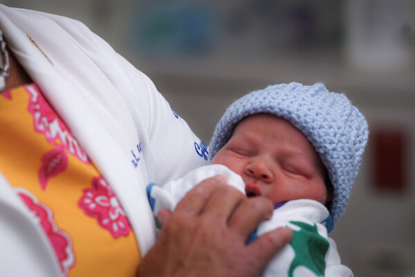 A cuddling program at Penn Medicine’s Chester County Hospital provides babies in the NICU with positive touch during medical procedures.