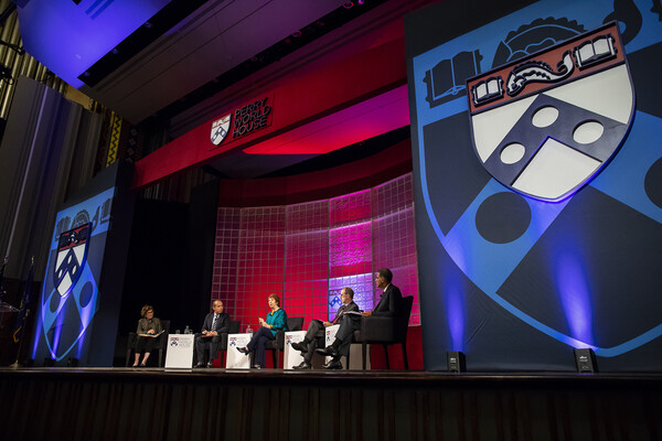 Panel on stage at Irvine Auditorium