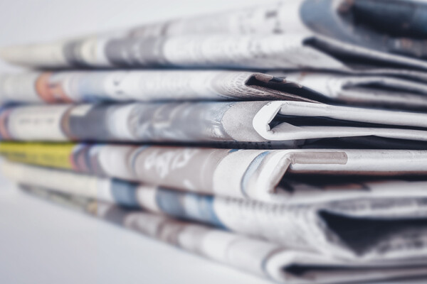 closeup of stack of newspapers