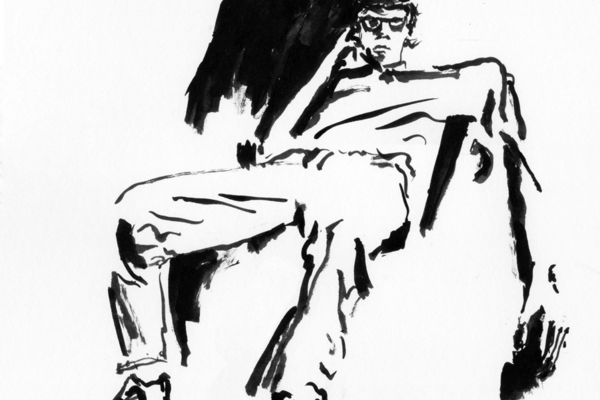 Dwayne Booth slouching in chair