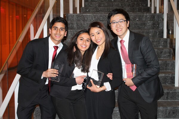 The four Y-Prize winners with their trophies.