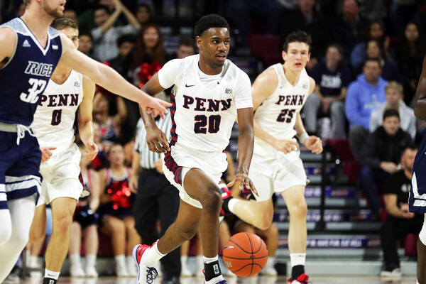 Freshman guard Bryce Washington dribbles up the court against Rice at the Palestra.