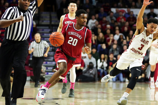 Freshman guard Bryce Washington dribbles up the court against Saint Joseph's at the Palestra.