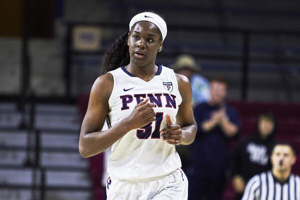 Sophomore center Eleah Parker jogs up the court.