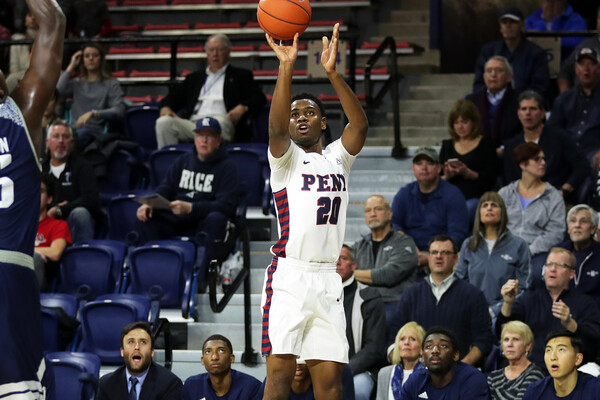 Freshman guard Bryce Washington shoots the ball against Rice at the Palestra.