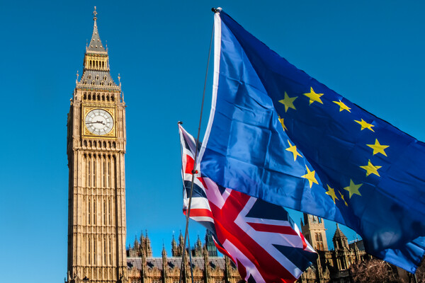 Big Ben with the U.K. and E.U. flags