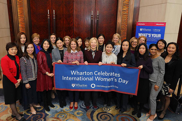 group of women gather for international women's day