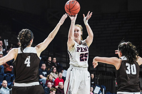 Senior guard Ashley Russell shoots a shot at a game at the Palestra.