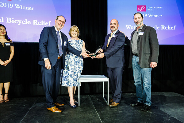 Recipients of the award on stage.