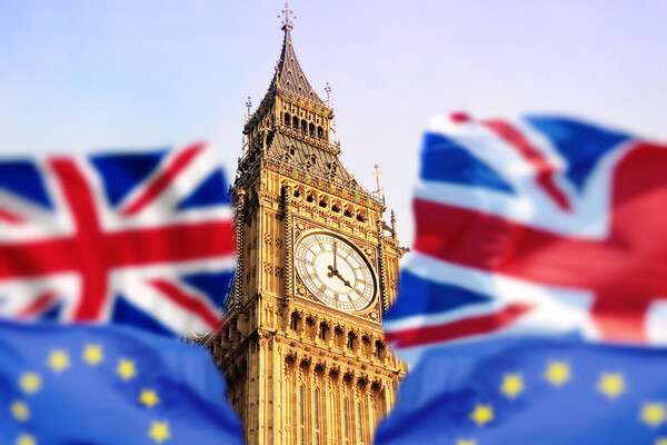 Big Ben with united kingdom and european union flags