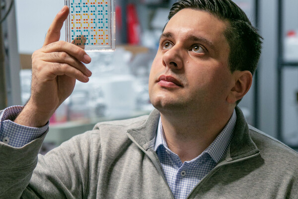 Andrei Georgescu holding up chip