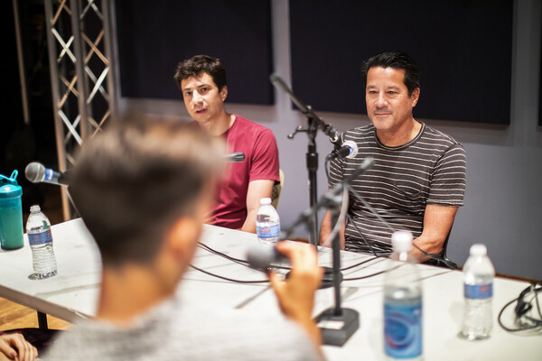 michael kearns recording a podcast