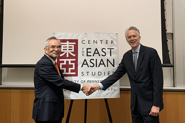 Ambassador Yamamouchi and Fred Dickinson shake hands