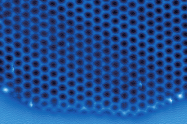 Microscopic image of ice with hexagonal linked shapes