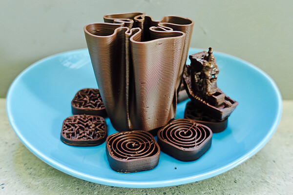 A dish of bespoke 3D printed chocolates