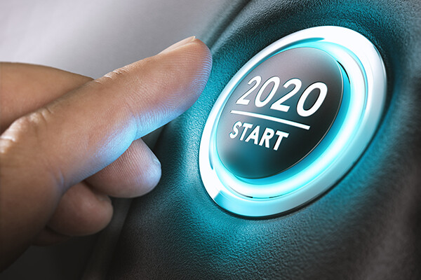 Finger about to press button that reads 2020 start