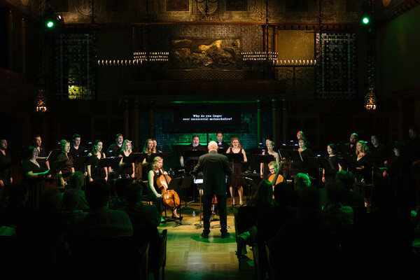 The Crossing choir gathered with composer in center