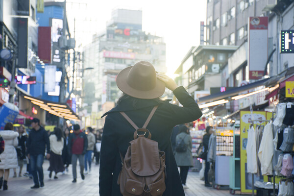 Person in middle of open market in Seoul