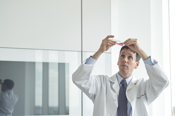 penn medicine doctor looking at sample