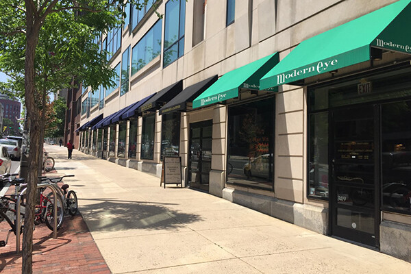 streetview of empty street with shops closed