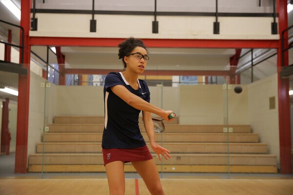 Senior Jessica Davis of the women's squash team prepares to swing her racquet during a match.