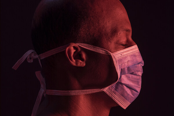 close up image of person with mask