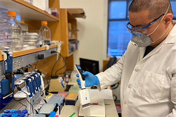 Hui Chen at work in a medical laboratory.