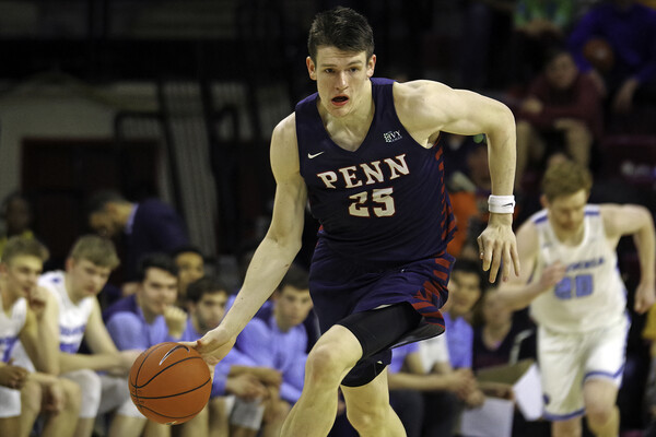 Against Columbia, A.J. Brodeur dribbles the ball up the court.