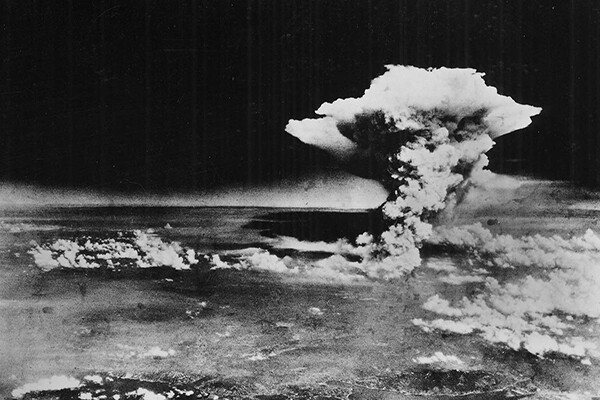 Mushroom cloud rises over Hiroshima after the American atomic bombing in 1945