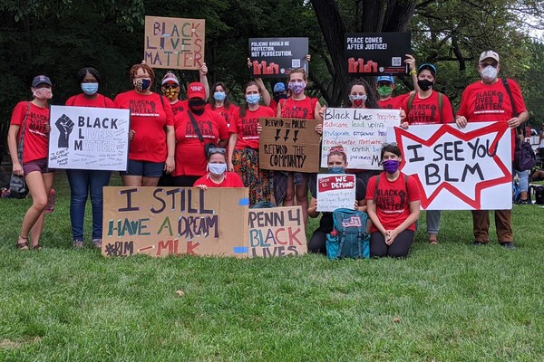 At the Commitment March, the 2020 March on Washington in the nation's capital, members of the SP2 community hold Black Lives Matter signs.