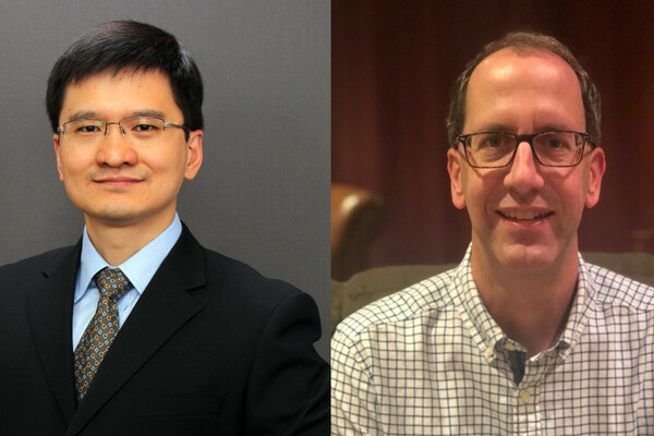 Close-up headshots of two people. The person on the left wears a suit and tie, the one on the right wears a plaid button-down shirt.