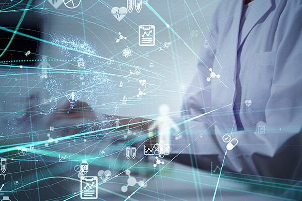 Floating graphic of digital medical imagery against a background of a medical professional’s hands and torso.