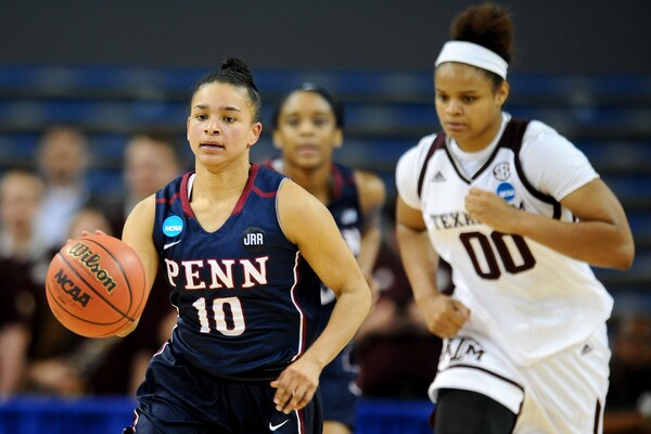 In 2017 during the NCAA Tournament, Anna Ross of the women's basketball team dribbles the ball up the court while trailed by a Texas A&M player.