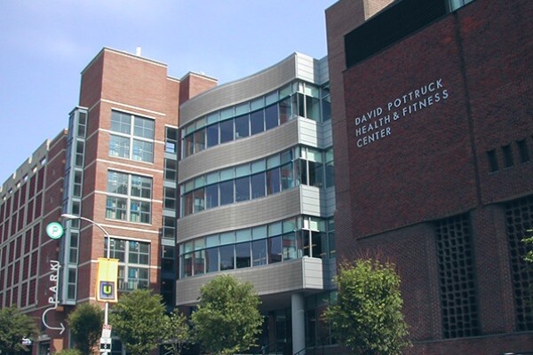 An exterior view of the Pottruck Health and Fitness Center, with the parking garage to the left.