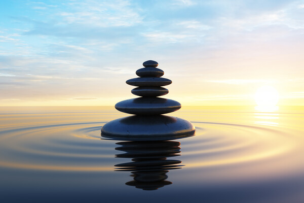 Rocks stacked in water.