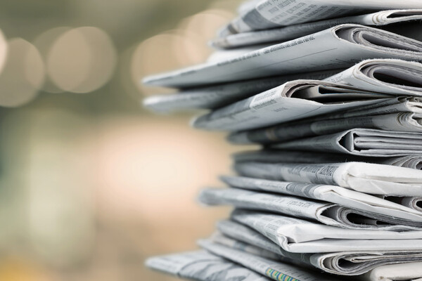 newspapers stacked