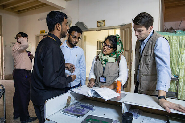 Nahreen Ahmed and medical personnel at a clinic in Yemen.